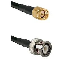 SMA to BNC cable with a gold SMA plug and a nickel BNC plug