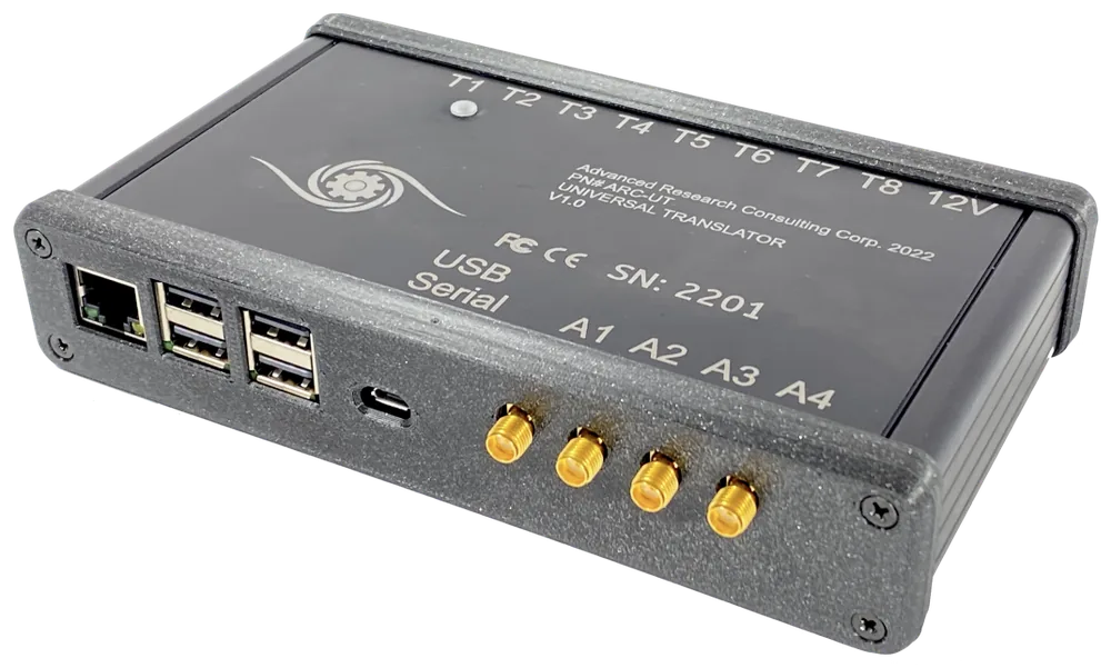 Universal Translator Mini: black enclosure with USB ports and four gold SMA connectors
